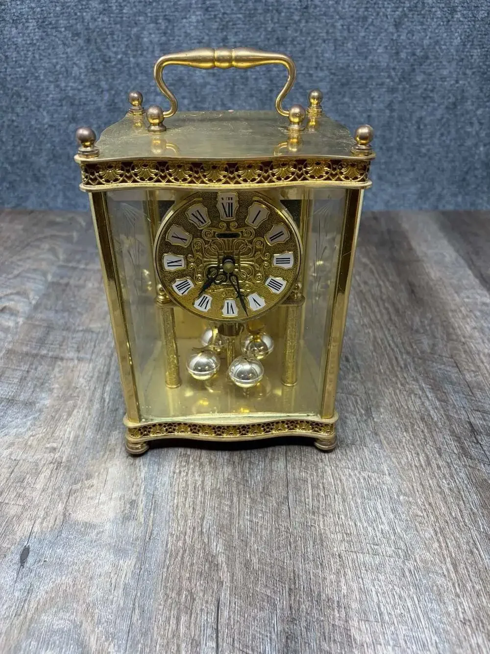 Haller Quartz Anniversary Mantel Clock Rotating Pendulum Glass brass W. Germany